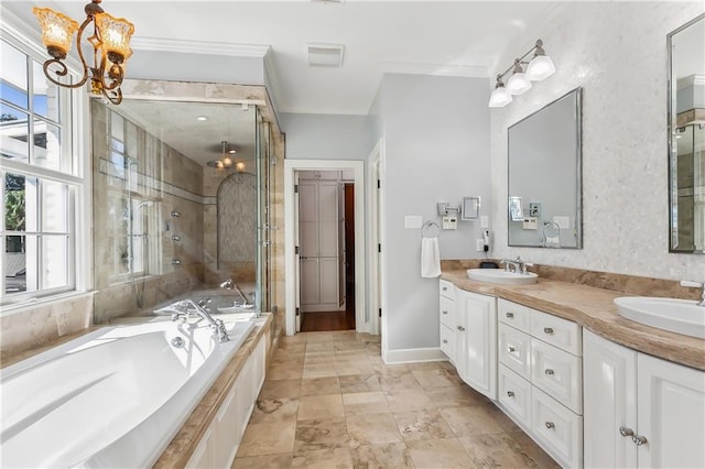 bathroom with a notable chandelier, a healthy amount of sunlight, ornamental molding, and shower with separate bathtub