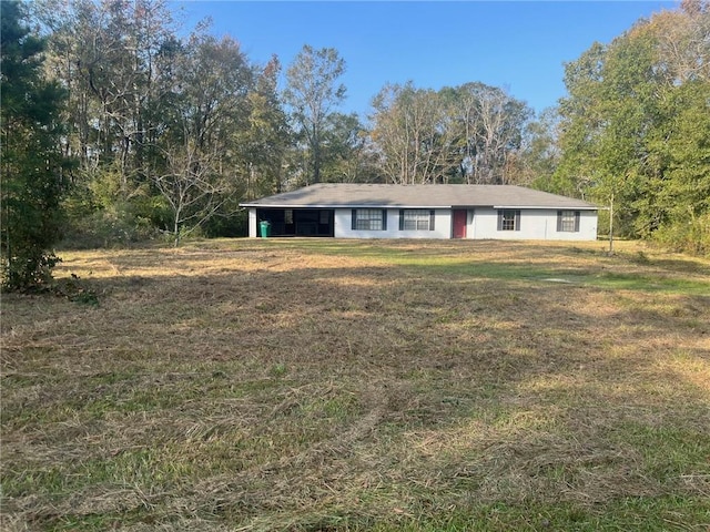 ranch-style house with a front yard