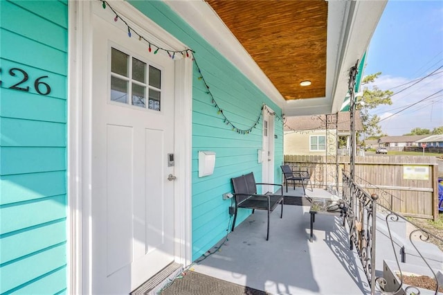 doorway to property with covered porch