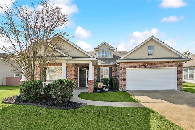 view of front of property with a garage and a front lawn