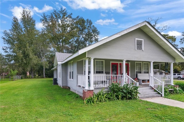 view of front facade with a front yard and a porch