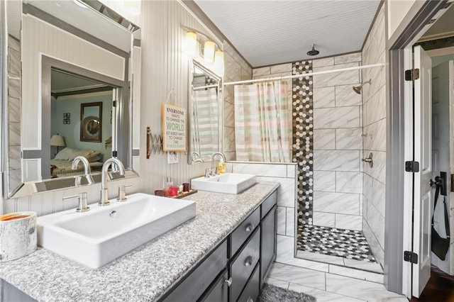 bathroom with vanity and walk in shower