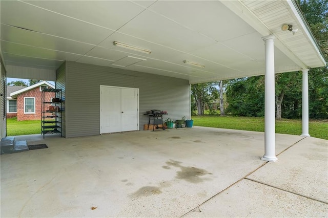 view of patio featuring a carport