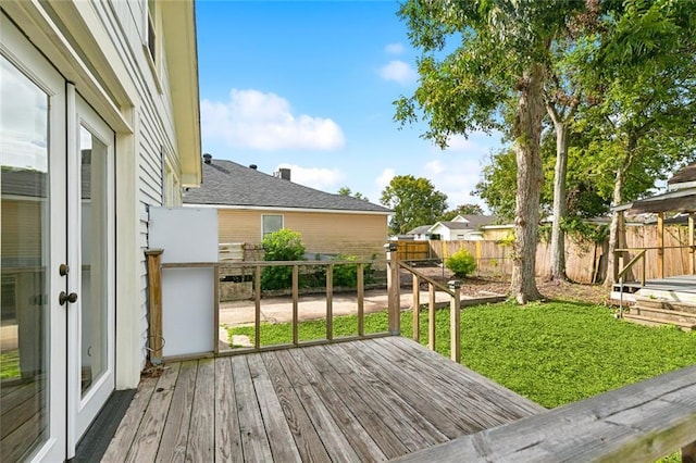 deck featuring a lawn