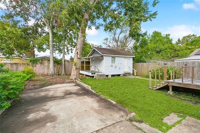 view of yard with a patio area and a deck