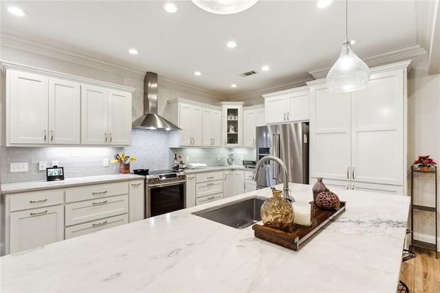 dining room featuring crown molding, beverage cooler, and light hardwood / wood-style floors