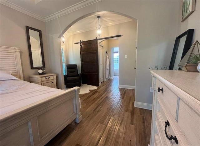 bedroom with ceiling fan, light hardwood / wood-style floors, ornamental molding, and a tray ceiling