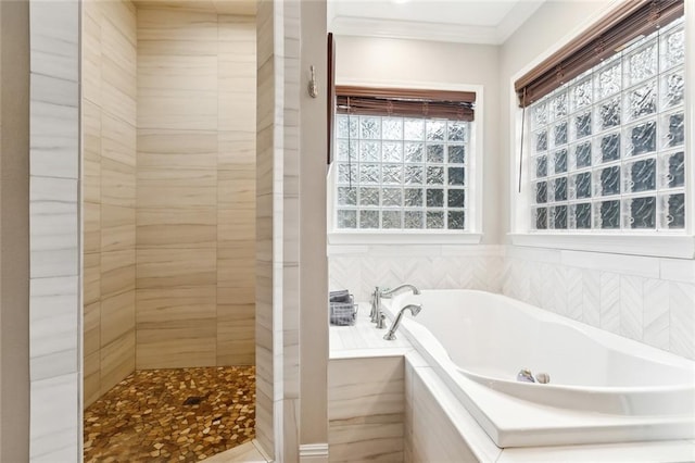 home office with light wood-type flooring, a wealth of natural light, and ornamental molding