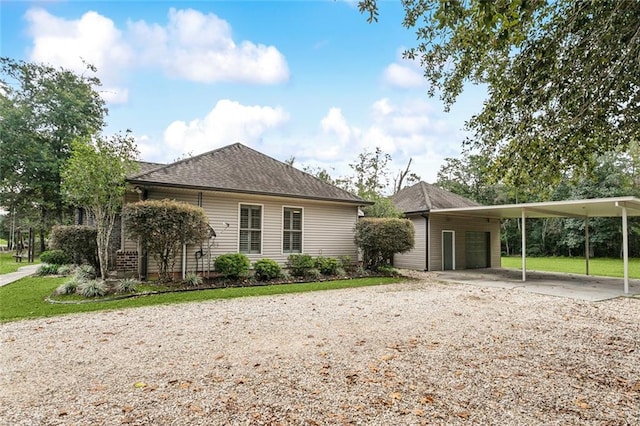 rear view of property with a sunroom, a yard, and a patio