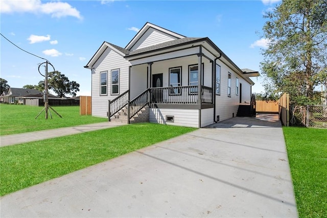 view of front facade with a porch and a front yard