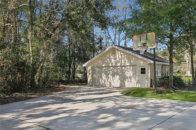 view of side of property with a garage