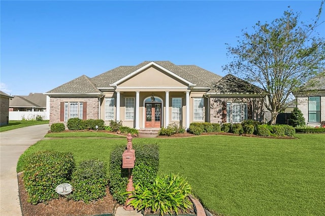 view of front of home with a front yard