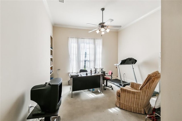 office with carpet flooring, ceiling fan, and ornamental molding