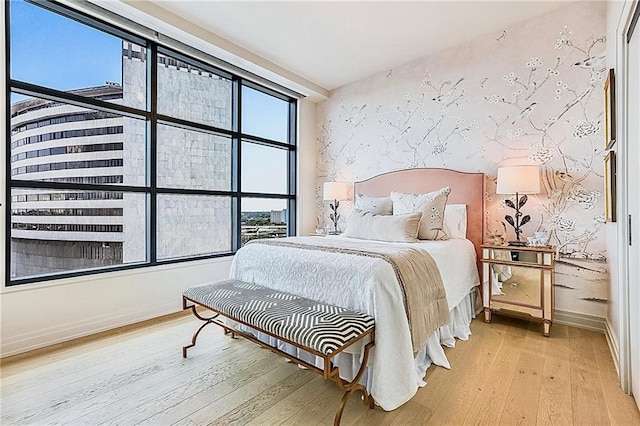 bedroom with light hardwood / wood-style floors