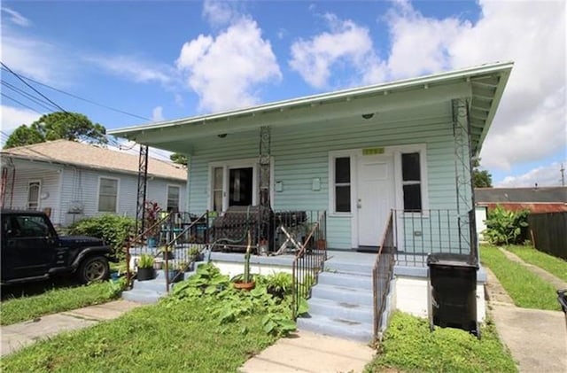 bungalow-style home with covered porch