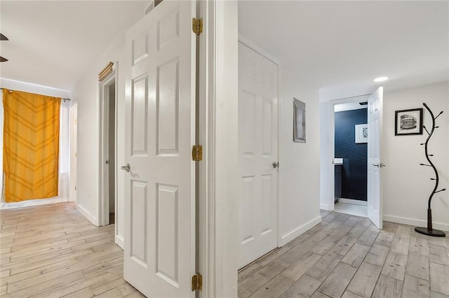 corridor featuring light hardwood / wood-style flooring