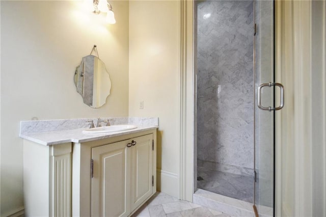 bathroom with vanity and walk in shower