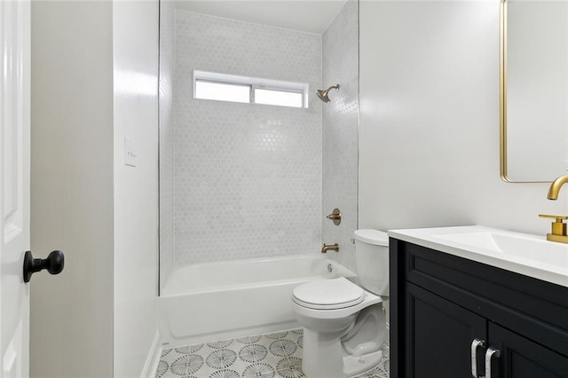 full bathroom with vanity, toilet, and tiled shower / bath