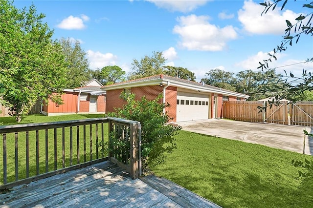 single story home with a storage unit, a deck, and a front lawn