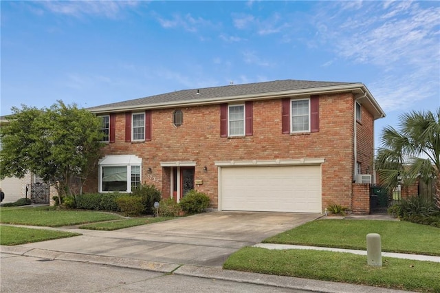 3733 Rockford Hts, Metairie, LA 70002 - colonial house with a garage, driveway, a front yard, and brick siding