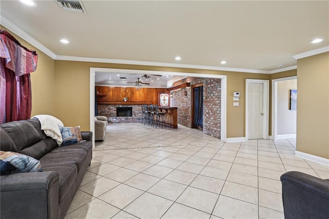 3733 Rockford Hts, Metairie, LA 70002 - tiled living room with ceiling fan, a fireplace, and crown molding