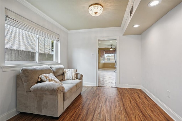 3733 Rockford Hts, Metairie, LA 70002 - living area with a wealth of natural light, crown molding, ceiling fan, and dark wood-type flooring