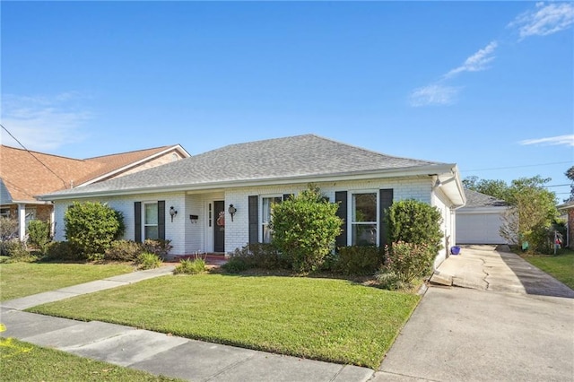 single story home featuring a front lawn and a garage