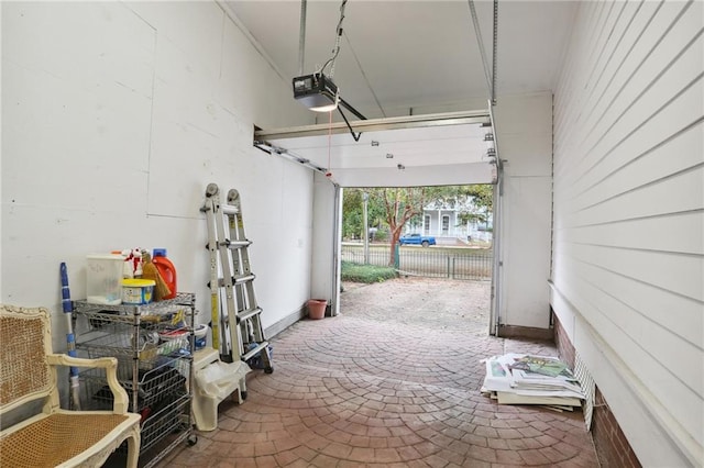 garage featuring a garage door opener