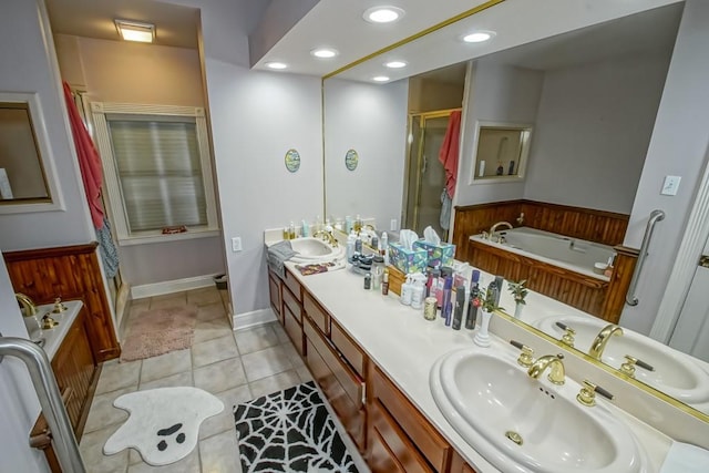 bathroom with tile patterned floors, vanity, and independent shower and bath