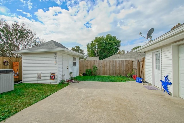 6300 W Metairie Ave, Metairie, LA 70003 - view of patio / terrace with cooling unit and an outbuilding