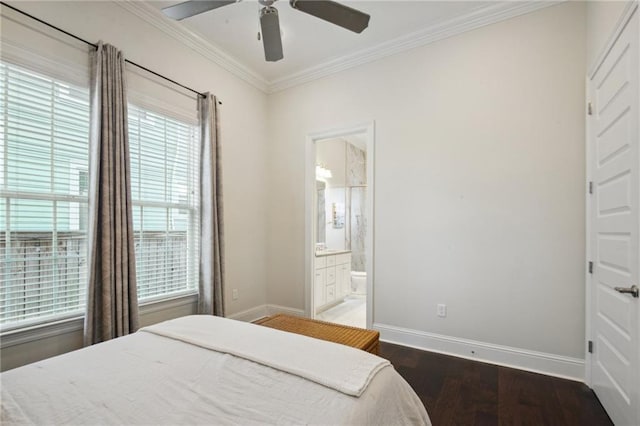 bedroom with connected bathroom, ceiling fan, dark hardwood / wood-style floors, and multiple windows