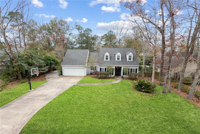 cape cod-style house with a garage and a front lawn