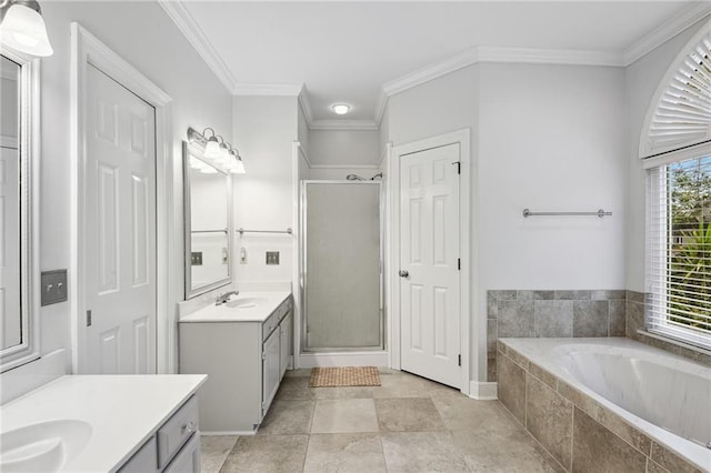 bathroom featuring separate shower and tub, tile patterned floors, vanity, and ornamental molding