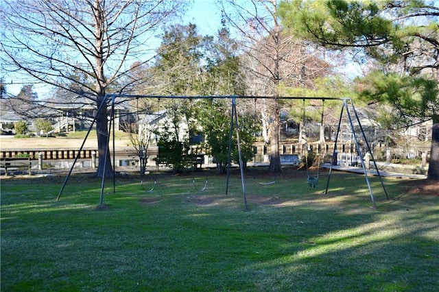 view of playground featuring a lawn