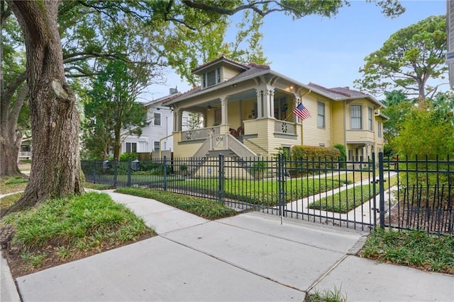 view of front of home with a front lawn and covered porch