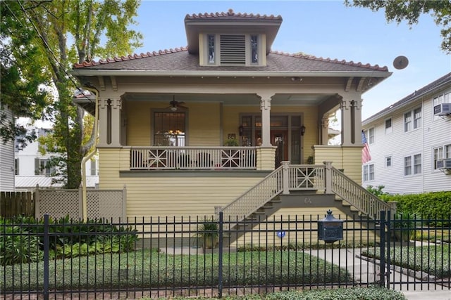 view of front of home featuring ceiling fan and covered porch