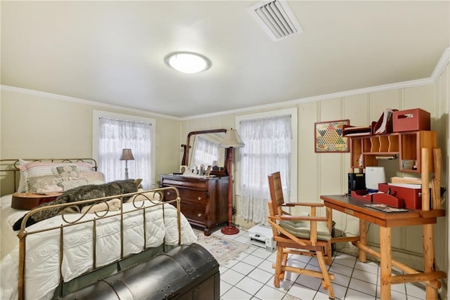 bedroom featuring multiple windows and ornamental molding