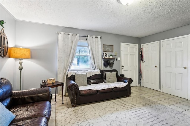 living room with a textured ceiling