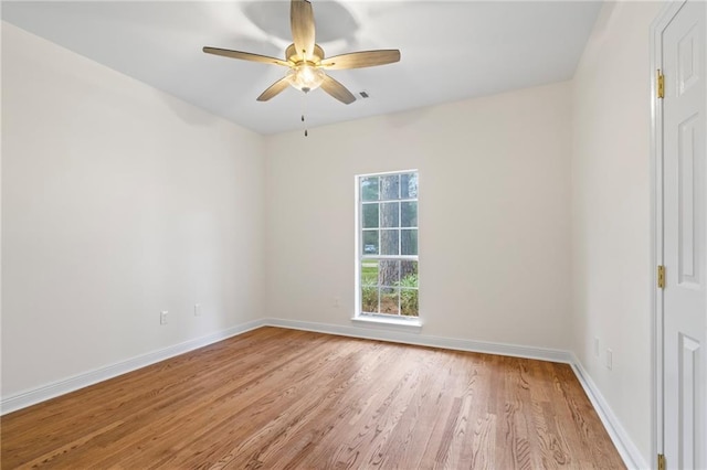 spare room with ceiling fan and light hardwood / wood-style flooring