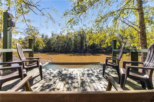 deck featuring a water view