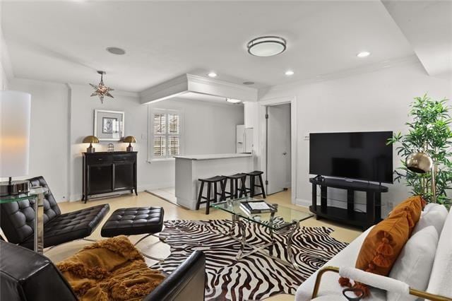 living room featuring ornamental molding