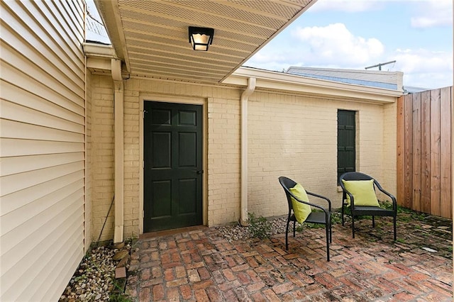 doorway to property with a patio