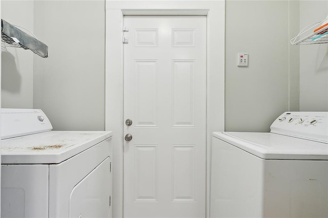 laundry area with washer and dryer