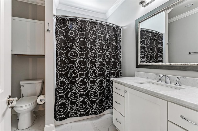 bathroom featuring crown molding, vanity, and toilet