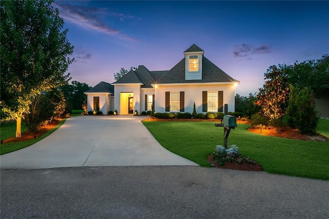 view of front of house with a lawn