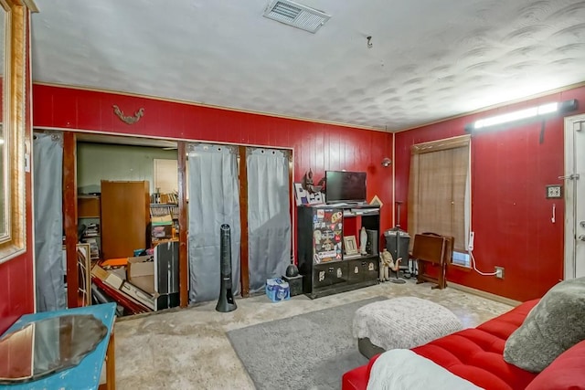 living room featuring concrete floors