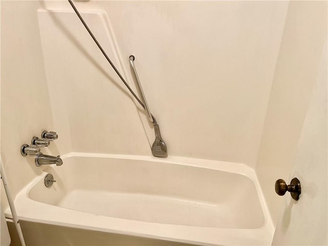 bathroom with shower / bathtub combination