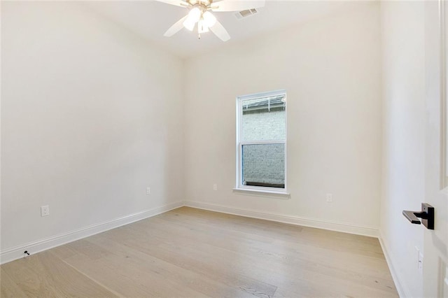 unfurnished room featuring ceiling fan and light wood-type flooring