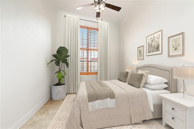 tiled bedroom with ceiling fan and ornamental molding