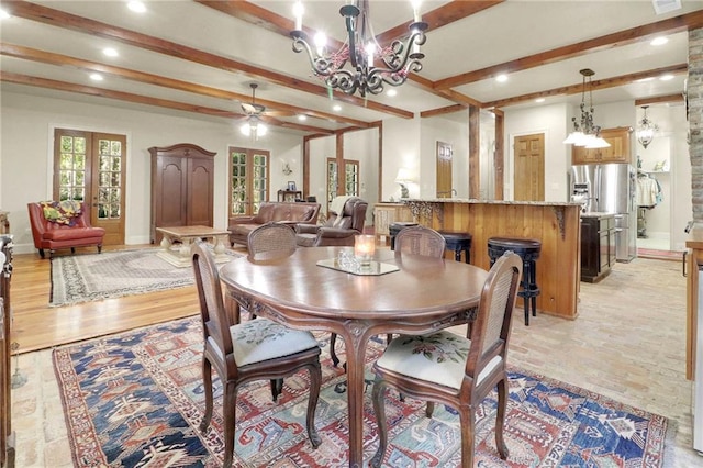 dining room with beam ceiling, light hardwood / wood-style flooring, french doors, and ceiling fan with notable chandelier